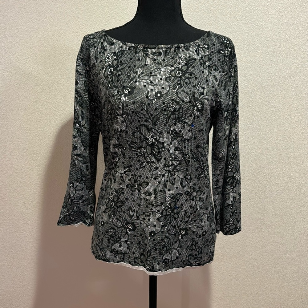 Elementz knit top with sequins. Medium fit but stretchy.